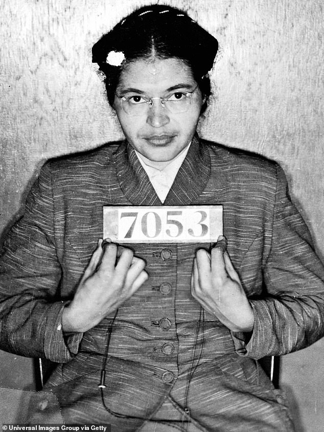 Pictured: American civil rights activist Rosa Parks after being arrested in 1955 for refusing to give up her seat on a bus