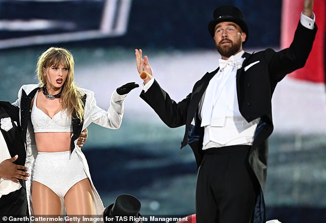 Taylor Swift was joined onstage by Travis Kelce, as he wore a tuxedo and top-hat