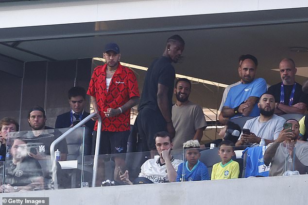Neymar (left) was confused by the decision as he watched from the stands at the SoFi Stadium