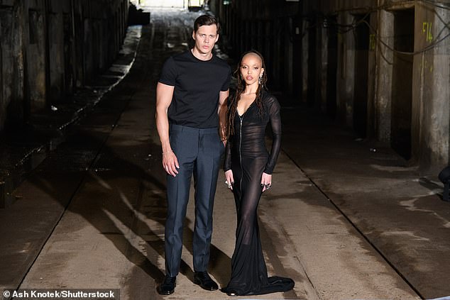 The 36-year-old singer looked stunning as she showed off her underwear through the racy dress as she posed with hunky co-star Bill Skarsgard