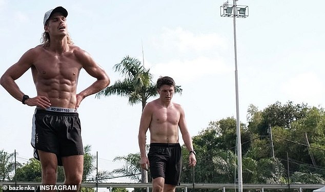 Smith (pictured left during a training session) is known as one of the hardest workers in the AFL, both on and off the field