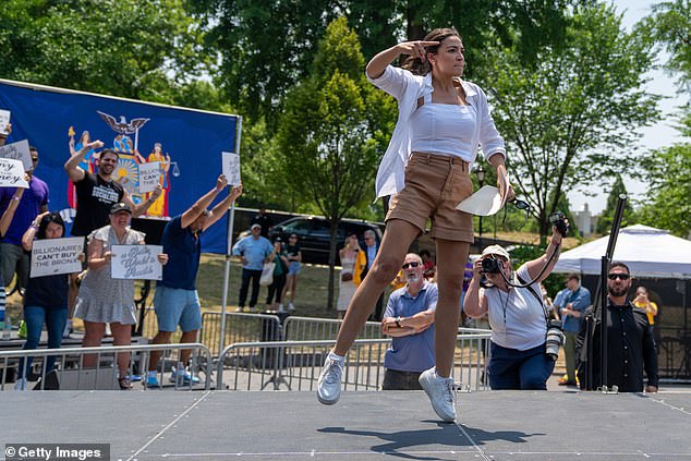 The incendiary New Yorker jumped around and waved her fists on stage as she tried to pump up the crowd at Saturday's event