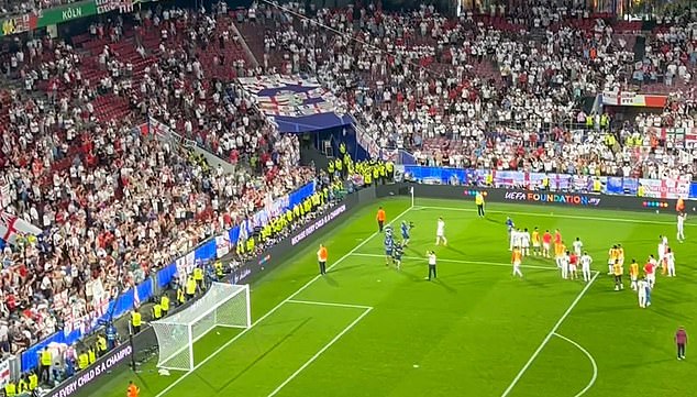 The England coach remained unmoved by the trophies and continued to applaud as he walked past them