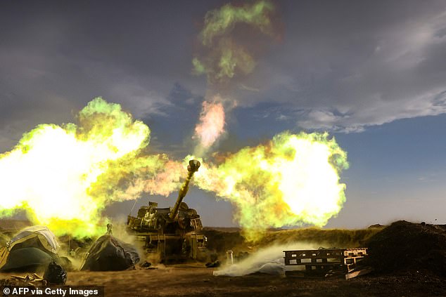 Israeli artillery unit fires during a military exercise near the border with Lebanon on November 2, 2023.