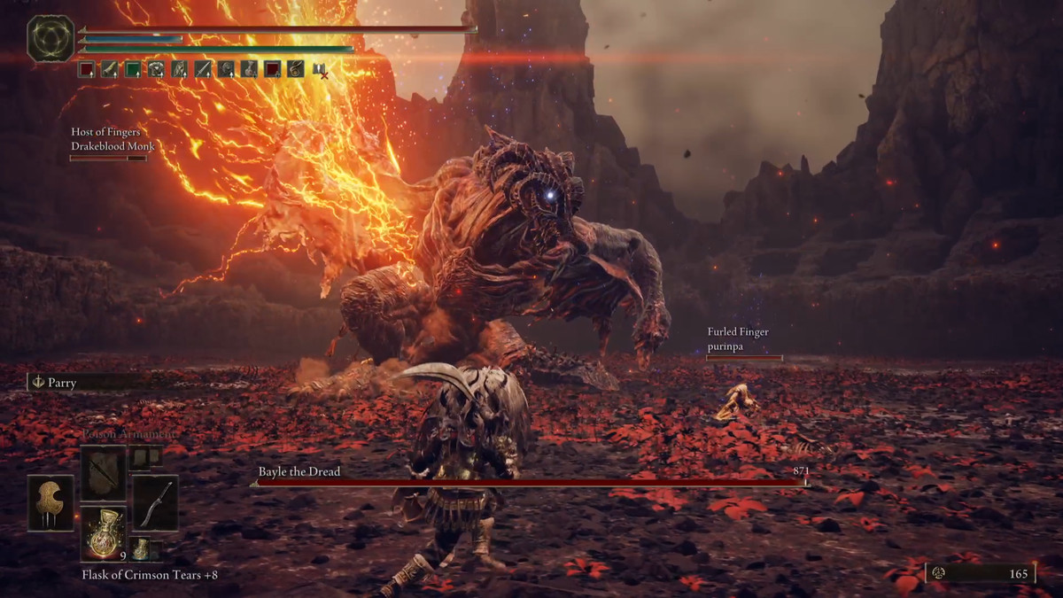 Bayle the Dread tries to attack an Elden Ring DLC ​​player during a boss battle.