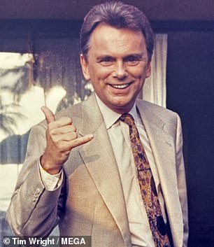 Former Wheel of Fortune host Pat Sajak shows off a shaka