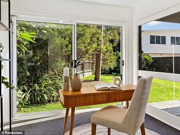 Located in a 'prized beachfront location', the property is surprisingly understated for a celebrity home with a simple backyard and spacious rooms as selling points