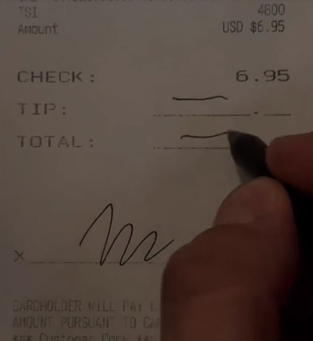 The man is seen not leaving a tip on a $6.95 check