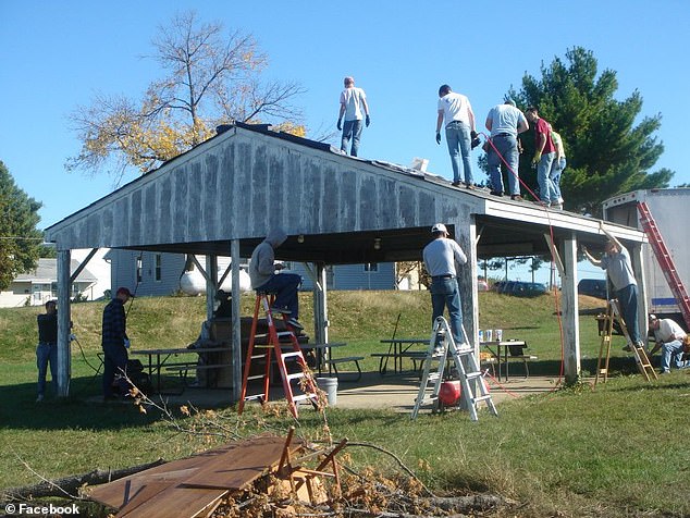 Residents build a structure as part of their vocational training