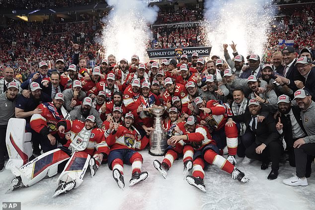 The Panthers pose with the Stanley Cup trophy after beating the Edmonton Oilers in Game 7