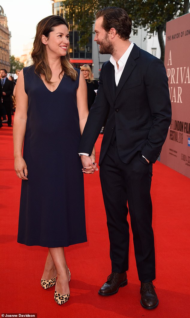 In a touching tribute, Jamie admitted that The Beach Boys' Forever would be at the top of the list because it reminds him of his wife, musician Amelia Warner (seen together in 2018)