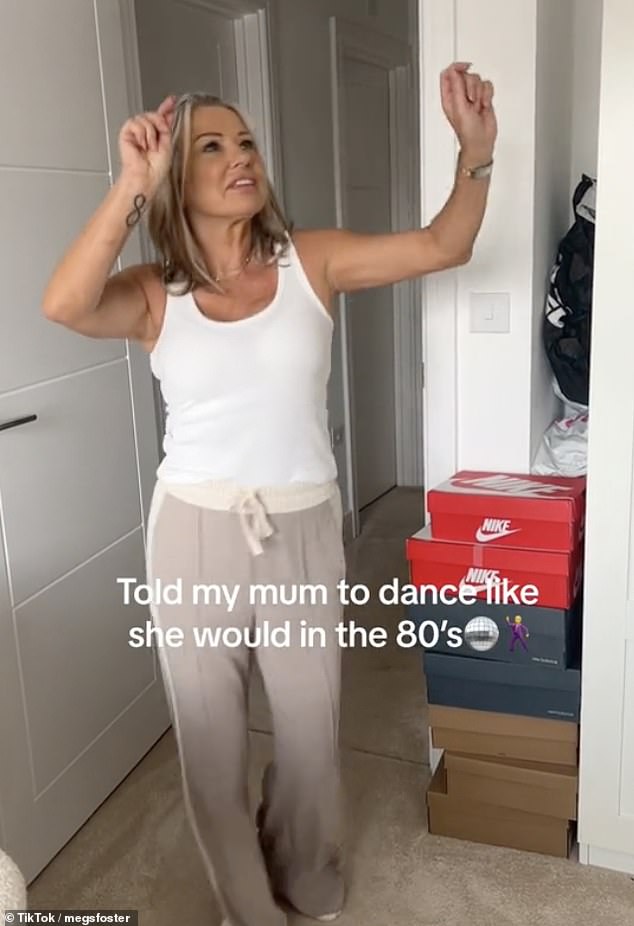 TikToker Meg, from Britain, also jumped on the trend and asked her mother (pictured) to dance as she stood on the threshold of her bedroom