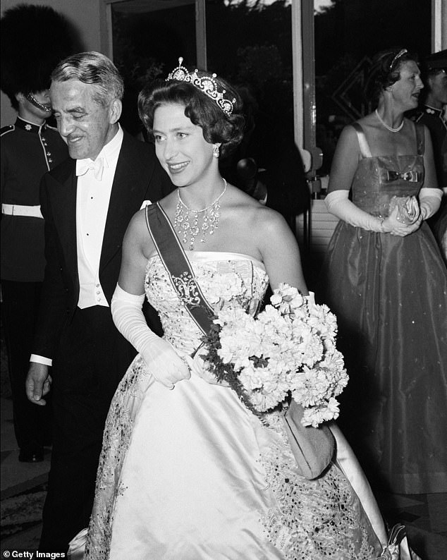 Princess Margaret was known to be a big fan of the tiara.  Pictured wearing it in 1959, in Portugal