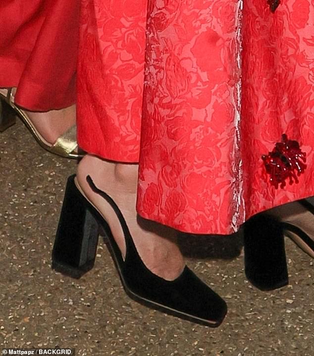 The British-American actress was left red-faced as she left the party when the strap on one of her heels snapped