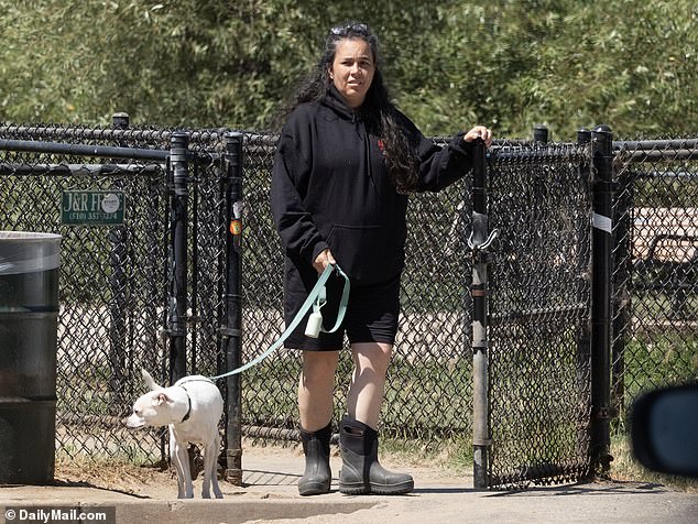 DailyMail.com can reveal that Cheyenne, 52, is now living the quiet, peaceful life her Hollywood star ex always desired in Alameda, California.  In the photo she is walking her dog in her neighborhood last weekend