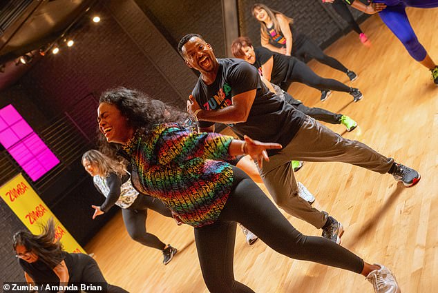 They appeared to be having fun as she wore a colorful top and he wore a Zumba shirt