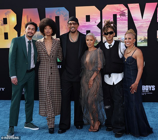 His mother-in-law Adrienne Banfield-Norris, 70, also showed her support and posed for photos with the family on the red carpet