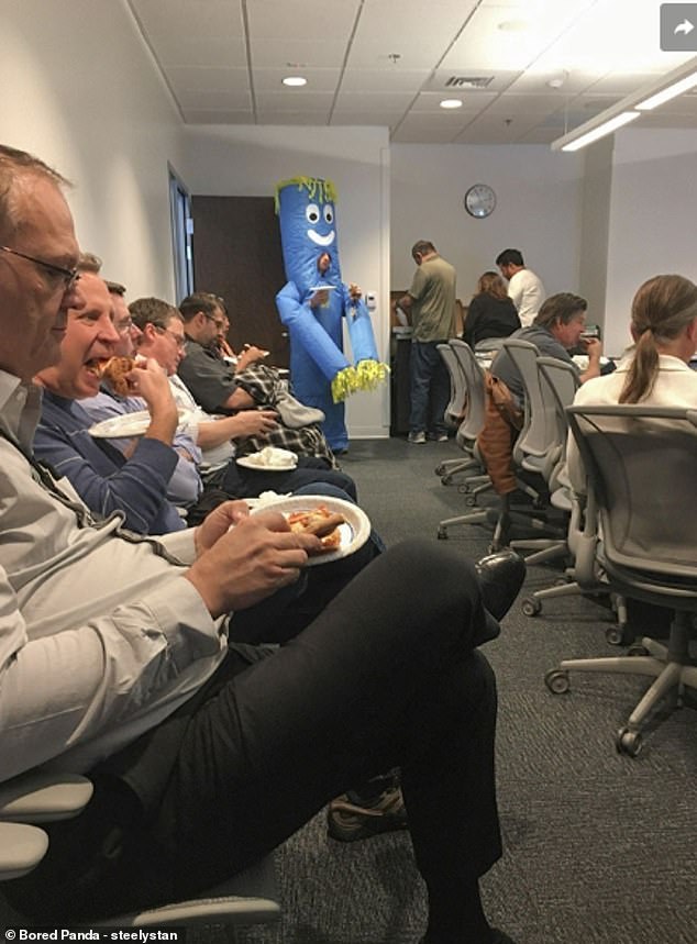 Someone thought they could liven things up by attending a company meeting in a Halloween costume