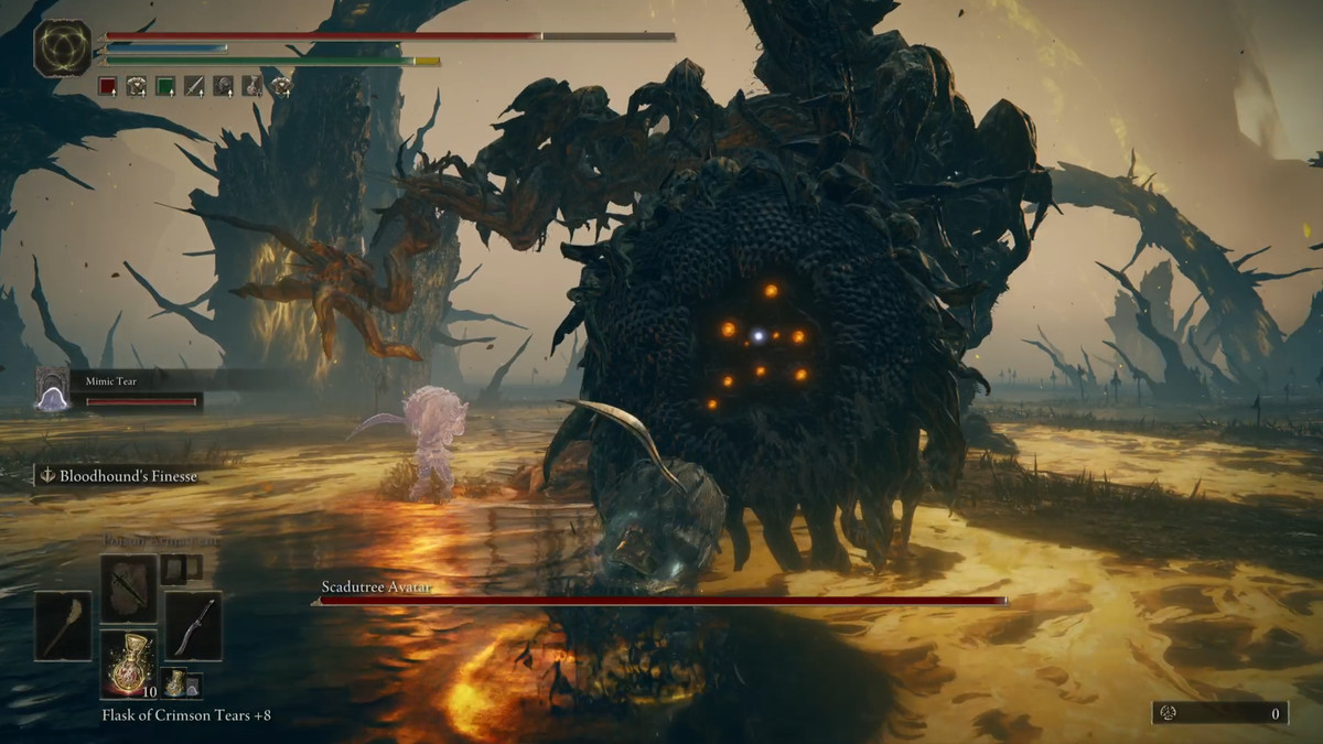 An Elden Ring DLC ​​player attacks the head of the Scadutree Avatar during a boss battle.