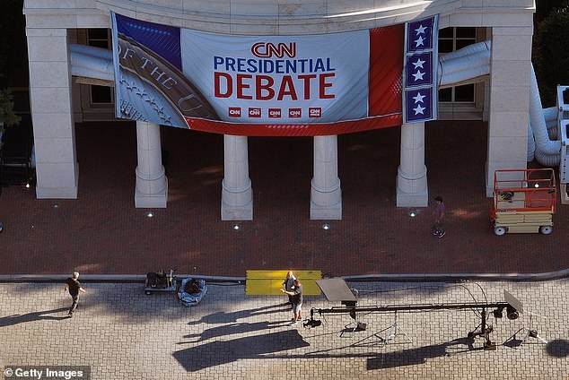 In an aerial view, signage for a CNN presidential debate is seen outside their Turner Entertainment Networks studios