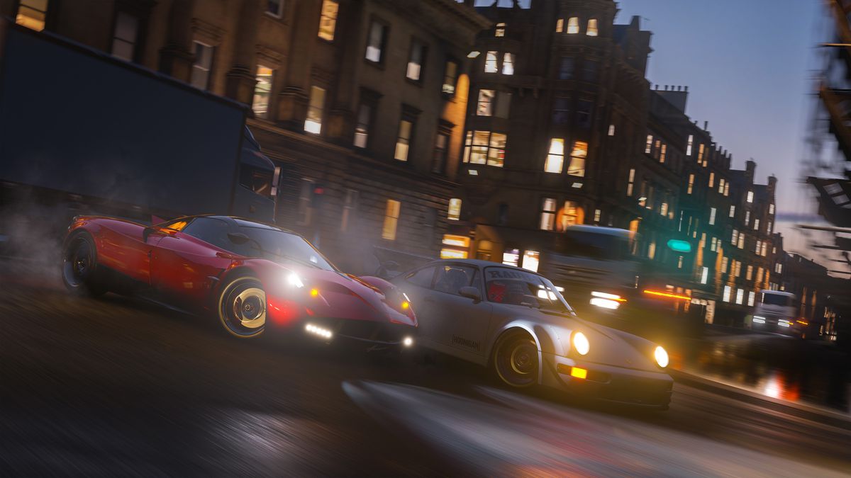 A Pagani and a Porsche drift around the corner during a night race on the streets of Edinburgh in Forza Horizon 4