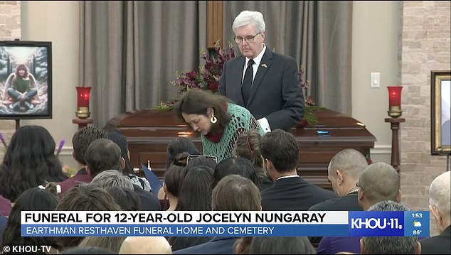 First Lady of Texas Cecilia Abbott (center) stands next to Lt. Gov. Dan Patrick as she addresses Jocelyn Nungaryay's other at her funeral in Houston Thursday