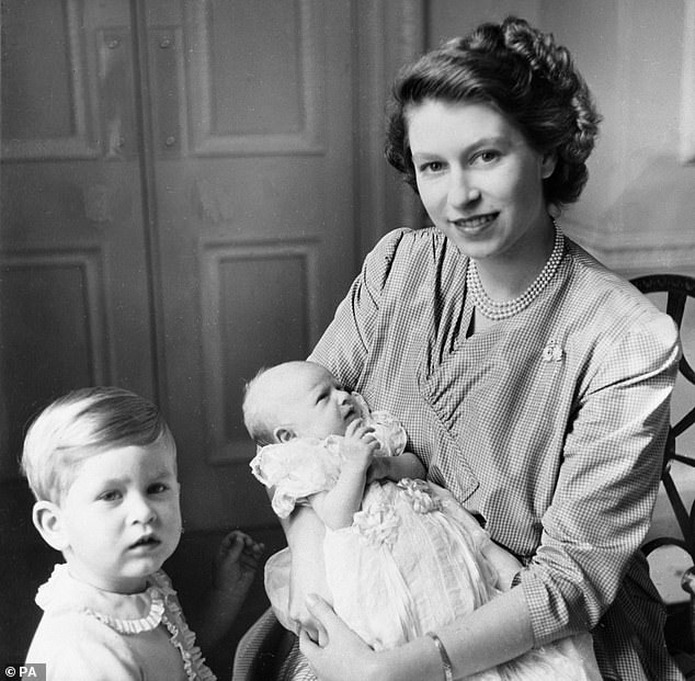 Queen Elizabeth with Prince Charles and a baby, Princess Anne.