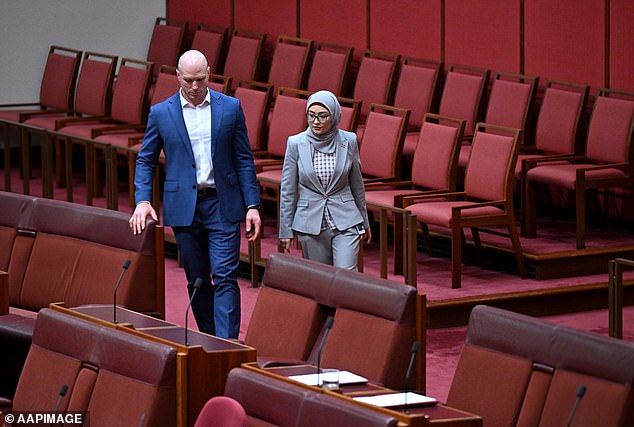 When push came to shove and the final vote on Greens Senator Nick McKim's motion for 'the Senate to recognize the State of Palestine' came, Fatima Payman (right) was approached by crossbencher David Pocock (left).  After a brief discussion, the pair walked together towards the Greens
