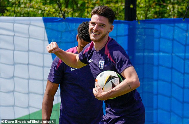 Declan Rice looks happy in training after playing a cricket match with captain Kane