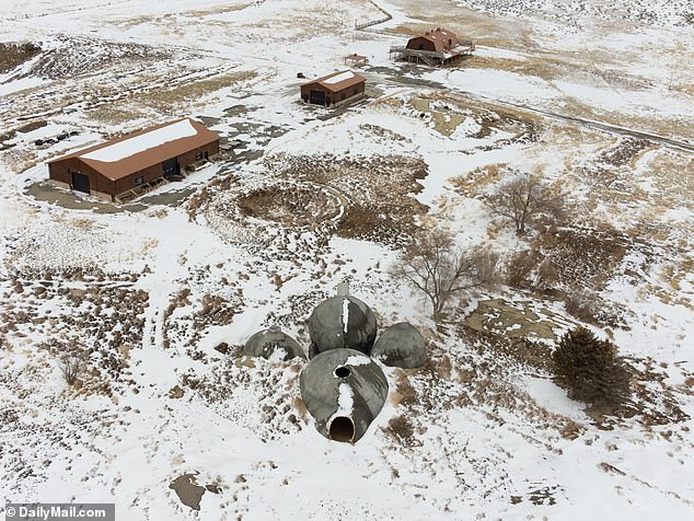 Several buildings and domes were seen amid snowfall in Wyoming in March 2023
