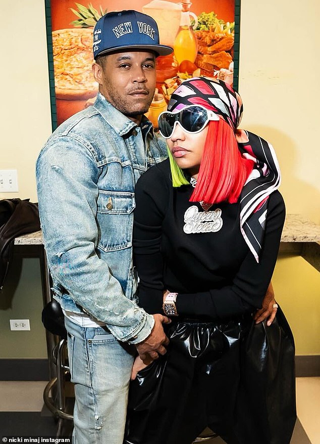 The feud between the two started after Megan ridiculed Nicki and her husband Kenneth (pictured together) in her song Hiss