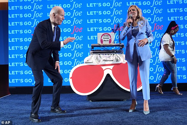 Joe and Jill Biden speak at a presidential debate watch party Thursday evening