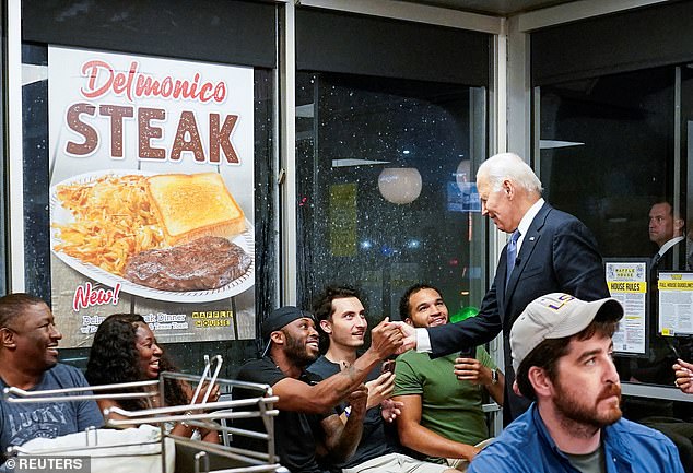 Biden greets supporters at a Waffle House after the event in Marietta, George