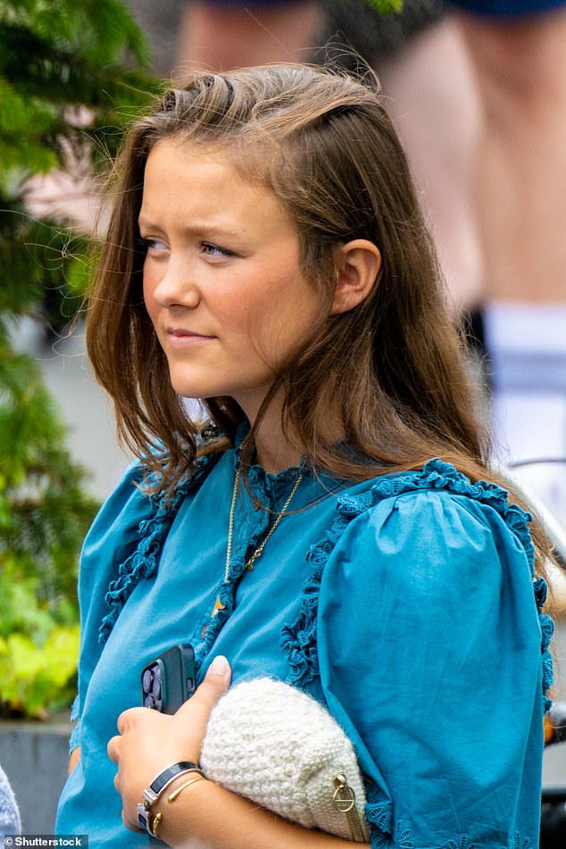 Princess Isabella wore a blue blouse with ruffles when she attended the ceremony
