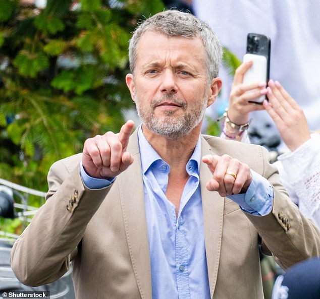 Father of four King Frederik opted for smart-casual in a beige jacket combined with a blue shirt