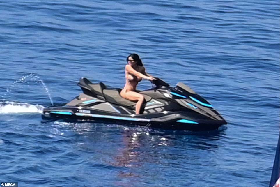 Lauren looked completely at ease as she glided effortlessly through the waves as she continued her sun-soaked holiday in Greece
