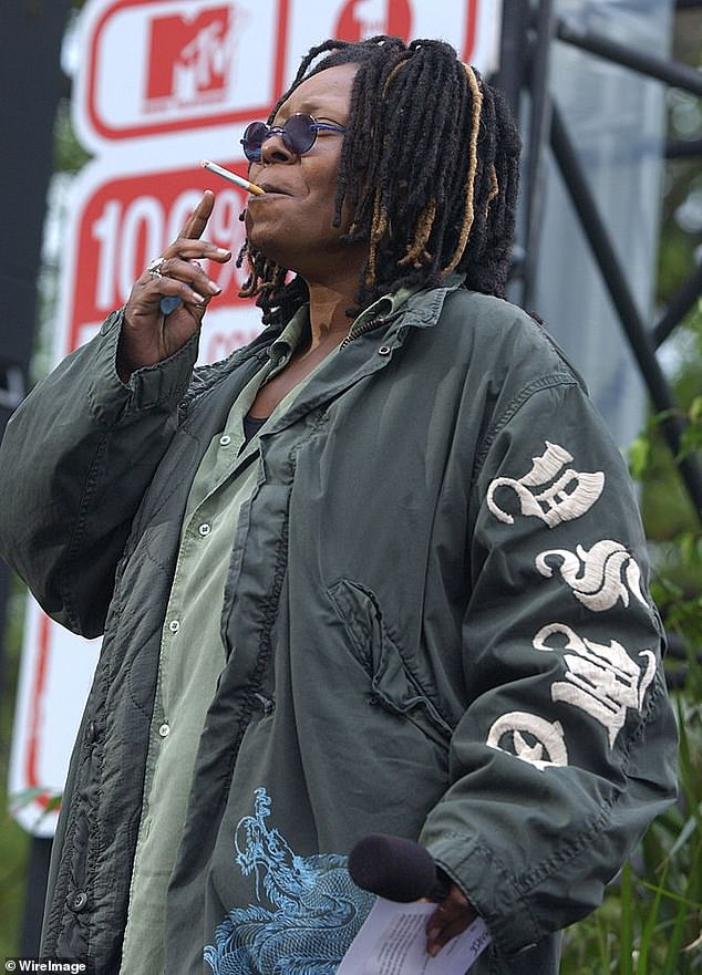 Whoopi, pictured here smoking a cigarette in 2003, used cannabis in the past to ease her menstrual cramps