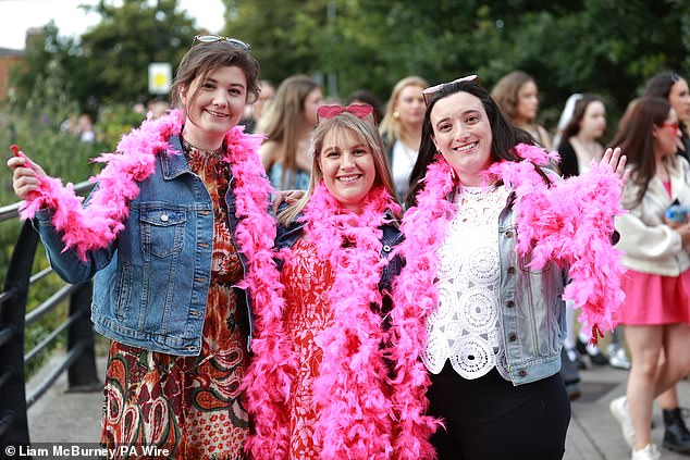 A plethora of pink feather boas, cowgirl hats and sequin ensembles were spotted as fans patiently waited to enter the venue