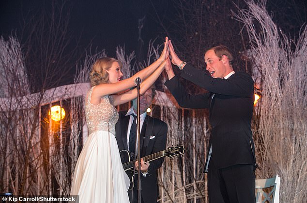 Taylor and William clasped hands as they sang Bon Jovi's famous song