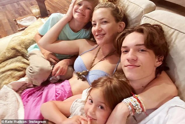 The 45-year-old actress is seen with sons Ryder and Bingham and daughter Rani