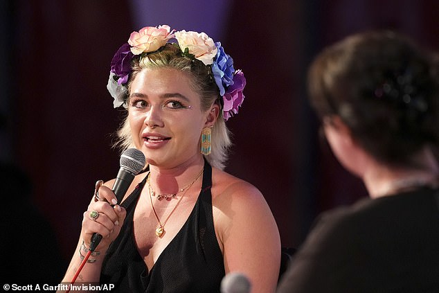 Oppenheimer star Florence Pugh says she wants to take a break from acting and hug and dance with her friends.  Pictured at the Pilton Palais Cinema at Glastonbury
