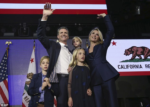 Democrat Gavin Newsom pictured with his wife Jennifer Siebel Newsom and their children