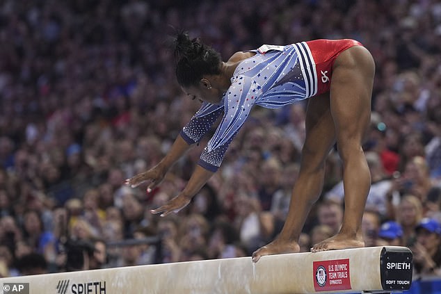 Simone Biles bounces on the balance beam during the United States Olympic gymnastics trials