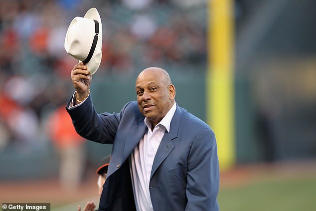 Orlando Cepeda waves to the crowd during a ceremony for Willie Mays' 80th birthday in 2011