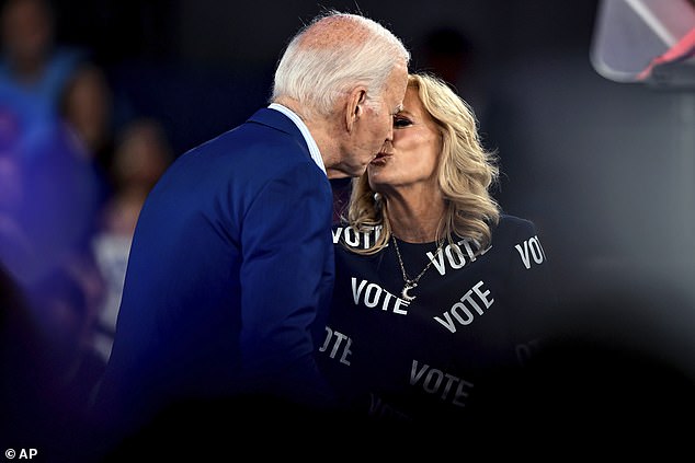Jill Biden gives Joe Biden a kiss - the couple has been married for 48 years