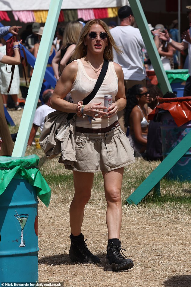 Ellie, 37, who last performed on stage at Glastonbury in 2016, showed off her toned arms as she was spotted on the festival grounds