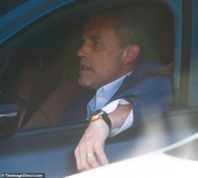 On Wednesday, Ben put his wedding ring back on as he left his Los Angeles office - after previously ditching the band