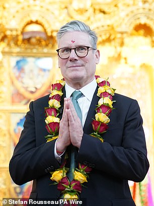 Sir Keir Starmer during a visit to a Hindu temple in London during his general election campaign