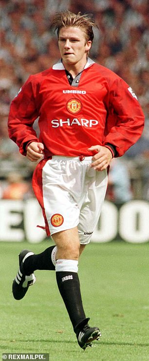David is seen on the pitch for Manchester United in 1997