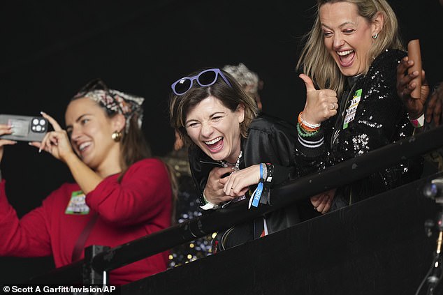 Jodie couldn't wipe the big smile off her face as she cheered her friend on from the VIP area
